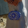 Corvian Clutch Bag