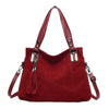 Faye Suede Handbag